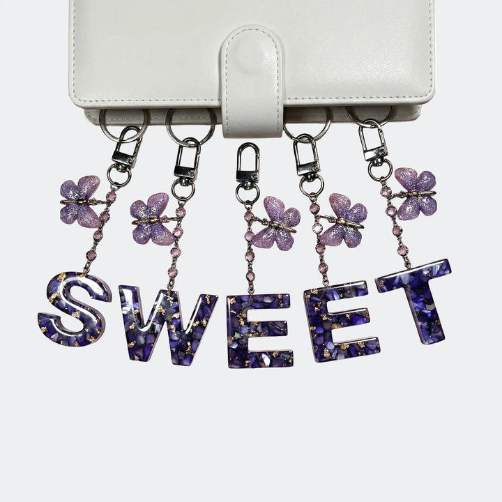 Buchstaben Binder Anhänger